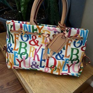 Dooney & Bourke colorful leather purse with leather handle.